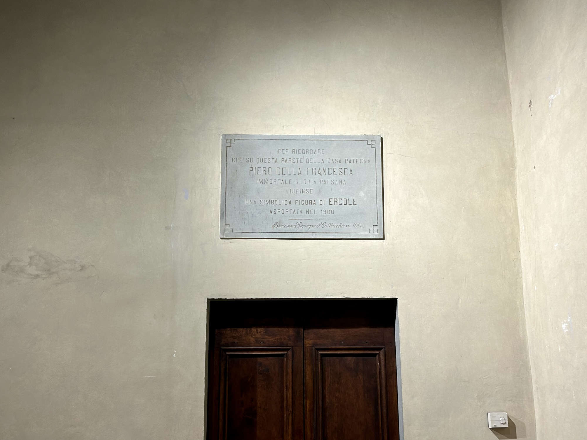 The original plaque placed after the removal of the fresco