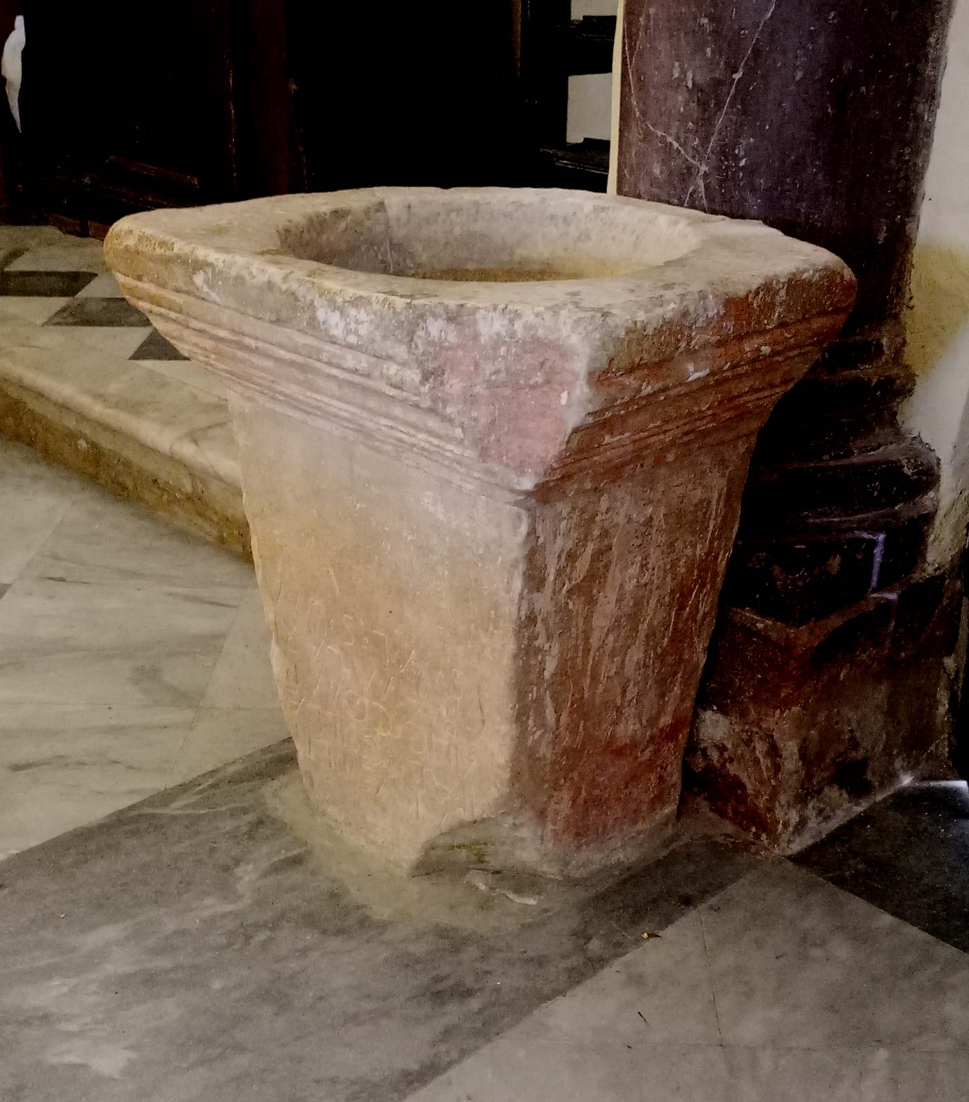 The stoup made from reused marble